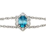 Silver Rosette Design Bracelet with Oval Sea Blue CZ