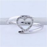 10k White Gold Womens Round Diamond Held Heart Fashion Ring 1/8 Cttw
